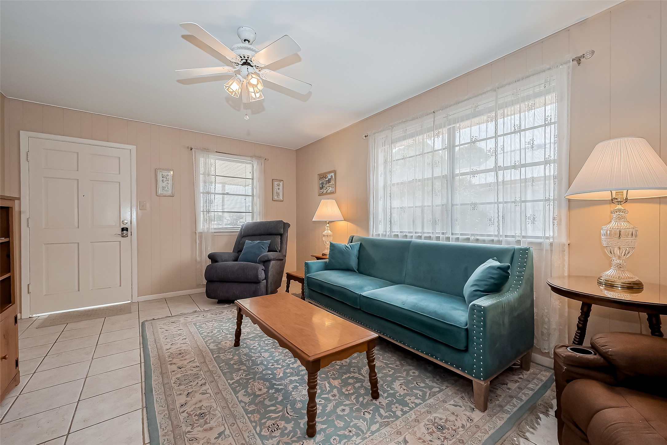 9214 Church Street Needville, TX 77461 - Photo 11 of 44 a living room with furniture and a window