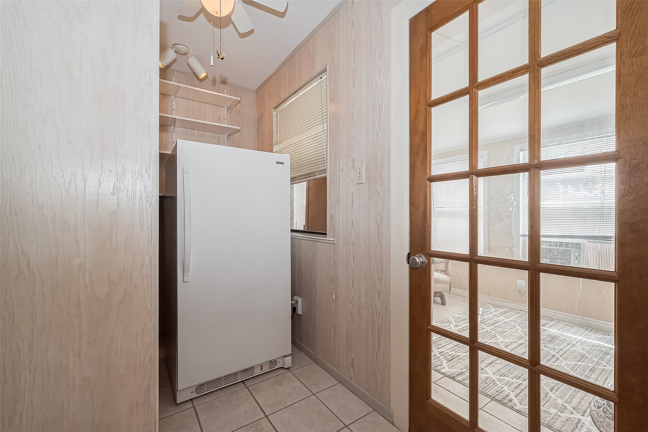 9214 Church Street Needville, TX 77461 - Photo 22 of 44 a view of an empty room with a window