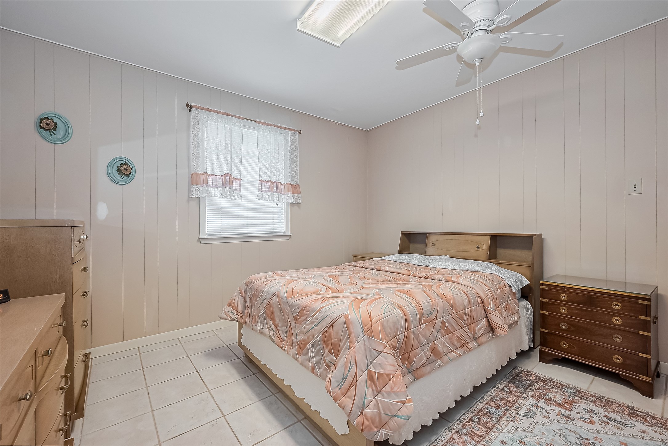 9214 Church Street Needville, TX 77461 - Photo 26 of 44 a bedroom with a bed and a window