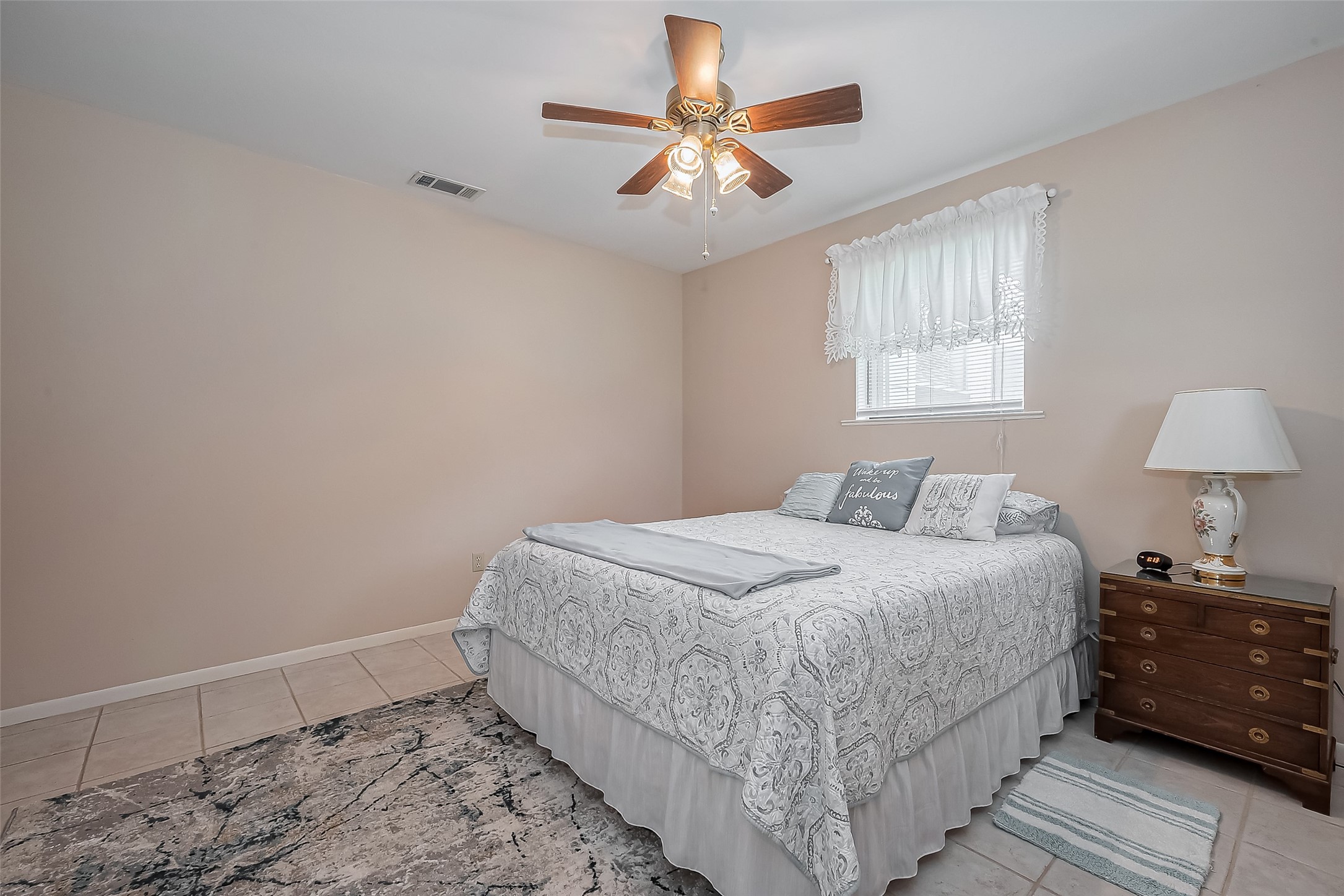 9214 Church Street Needville, TX 77461 - Photo 30 of 44 a bedroom with a bed and a window