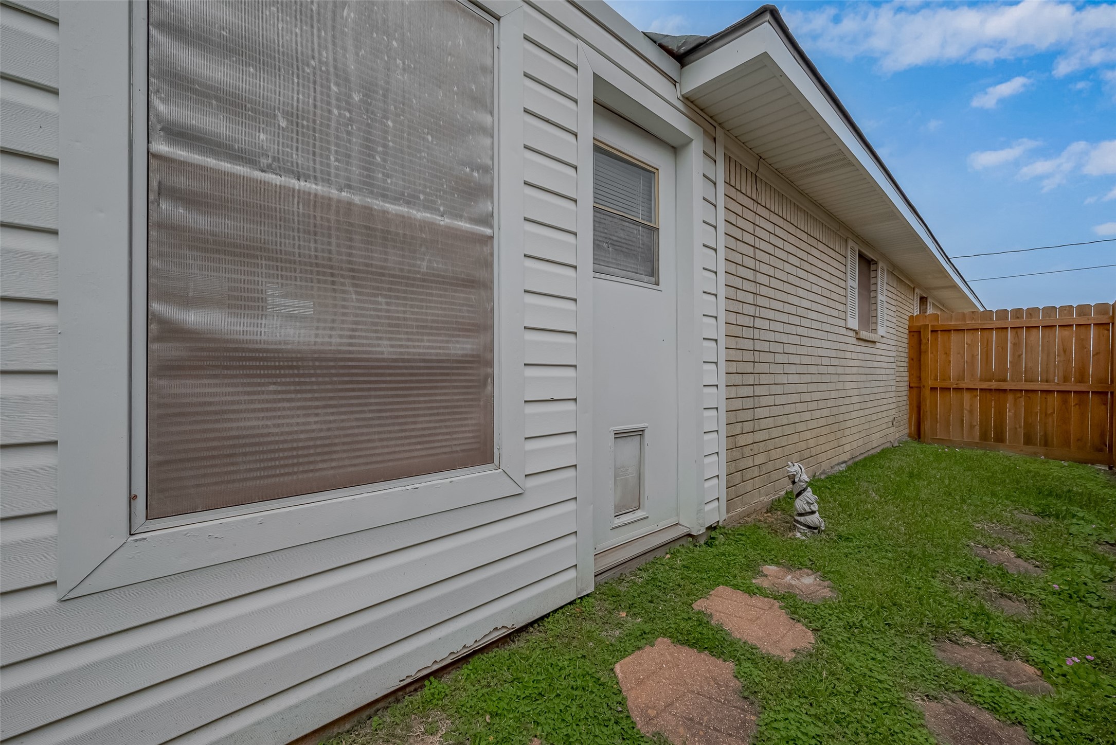 9214 Church Street Needville, TX 77461 - Photo 40 of 44 a view of house with backyard