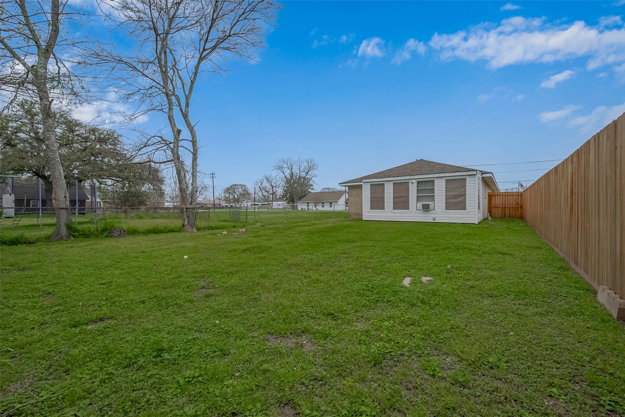 9214 Church Street Needville, TX 77461 - Photo 41 of 44 a view of a house with a yard