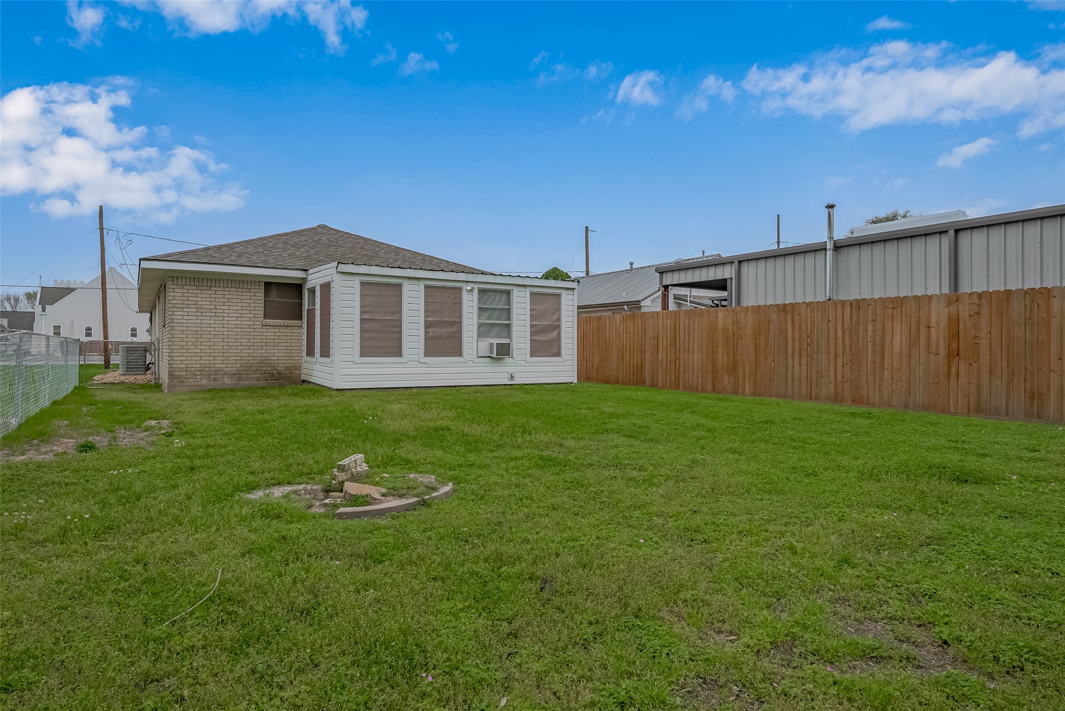 9214 Church Street Needville, TX 77461 - Photo 43 of 44 a front view of a house with garden