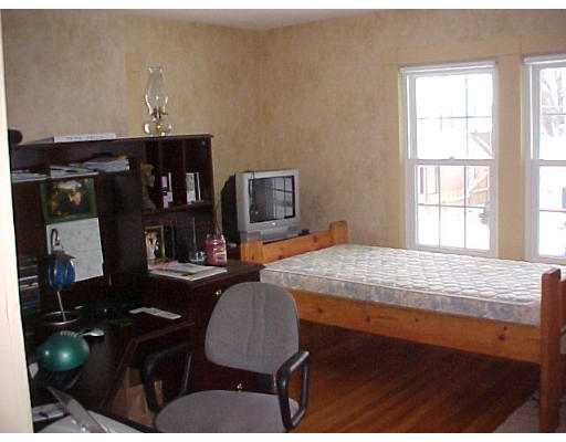 25 Winnipeg Street Springfield, MA 01108 - Photo 12 of 20 a dining room with furniture and wooden floor