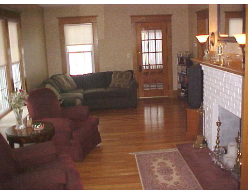 25 Winnipeg Street Springfield, MA 01108 - Photo 5 of 20 a living room with furniture window and wooden floor