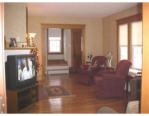 25 Winnipeg Street Springfield, MA 01108 - Photo 6 of 20 a living room with furniture and a fireplace