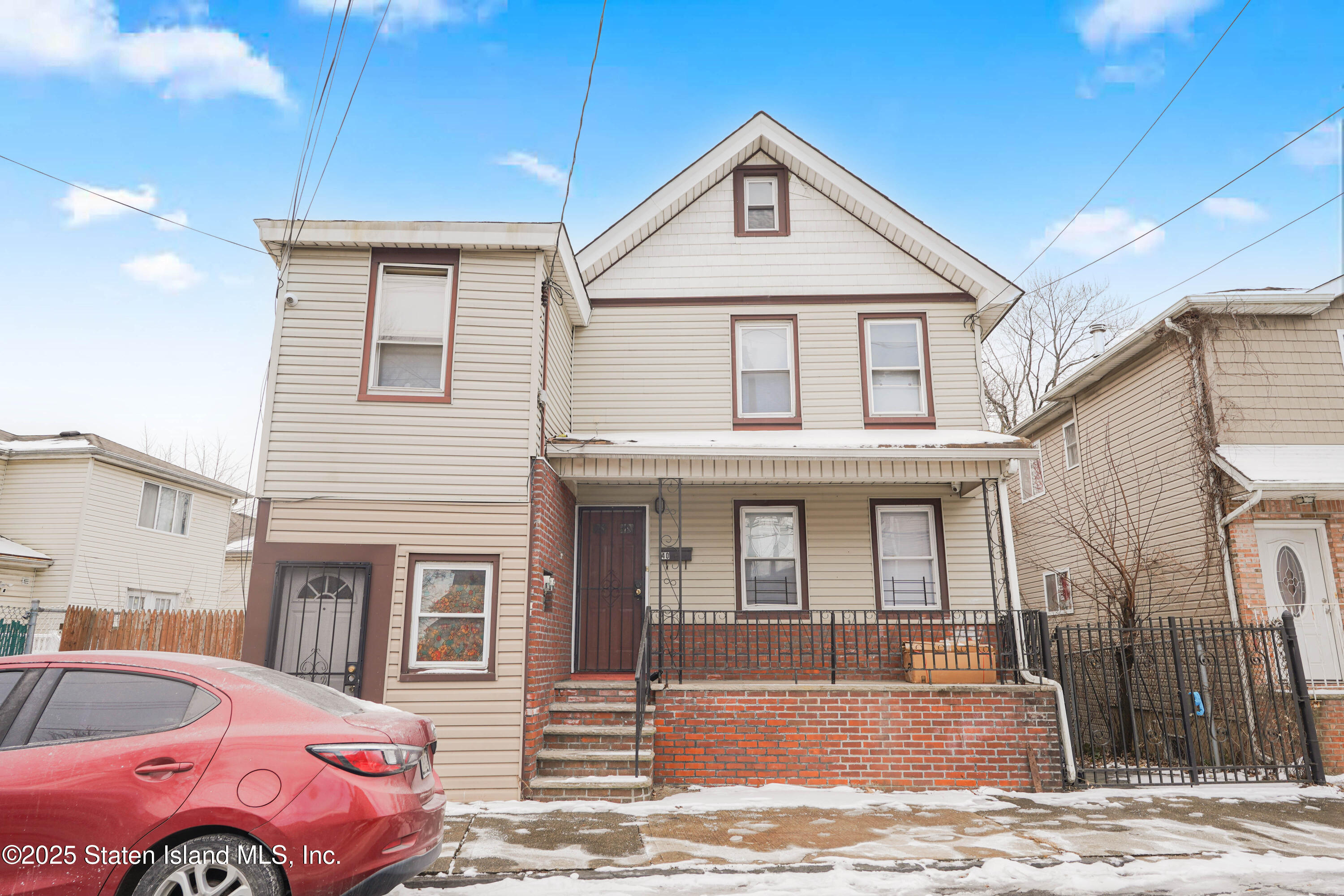 40 Larkin Street Staten Island, NY 10302 - Photo 1 of 36 a front view of a house with parking space