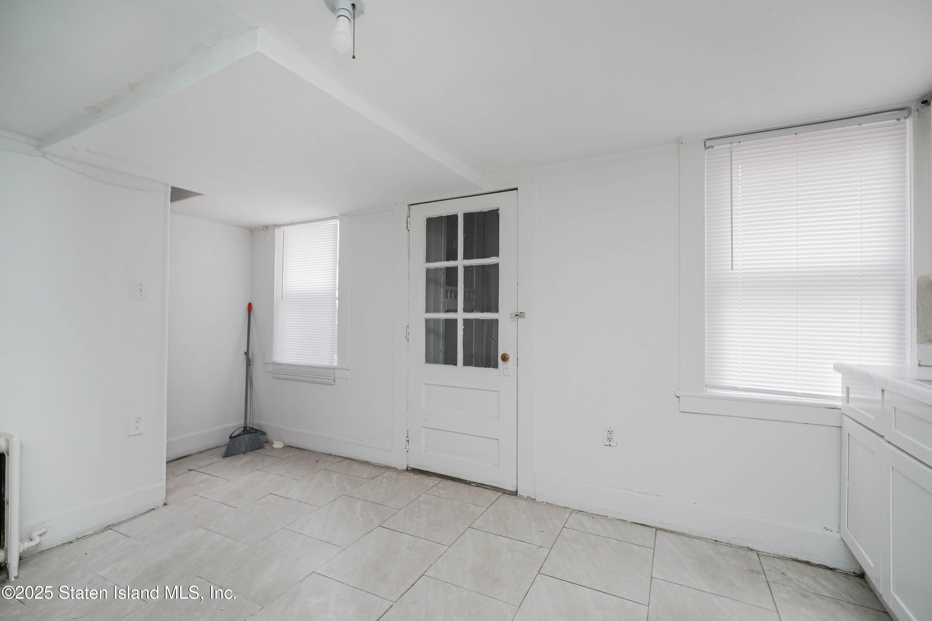 40 Larkin Street Staten Island, NY 10302 - Photo 13 of 36 an empty room with windows