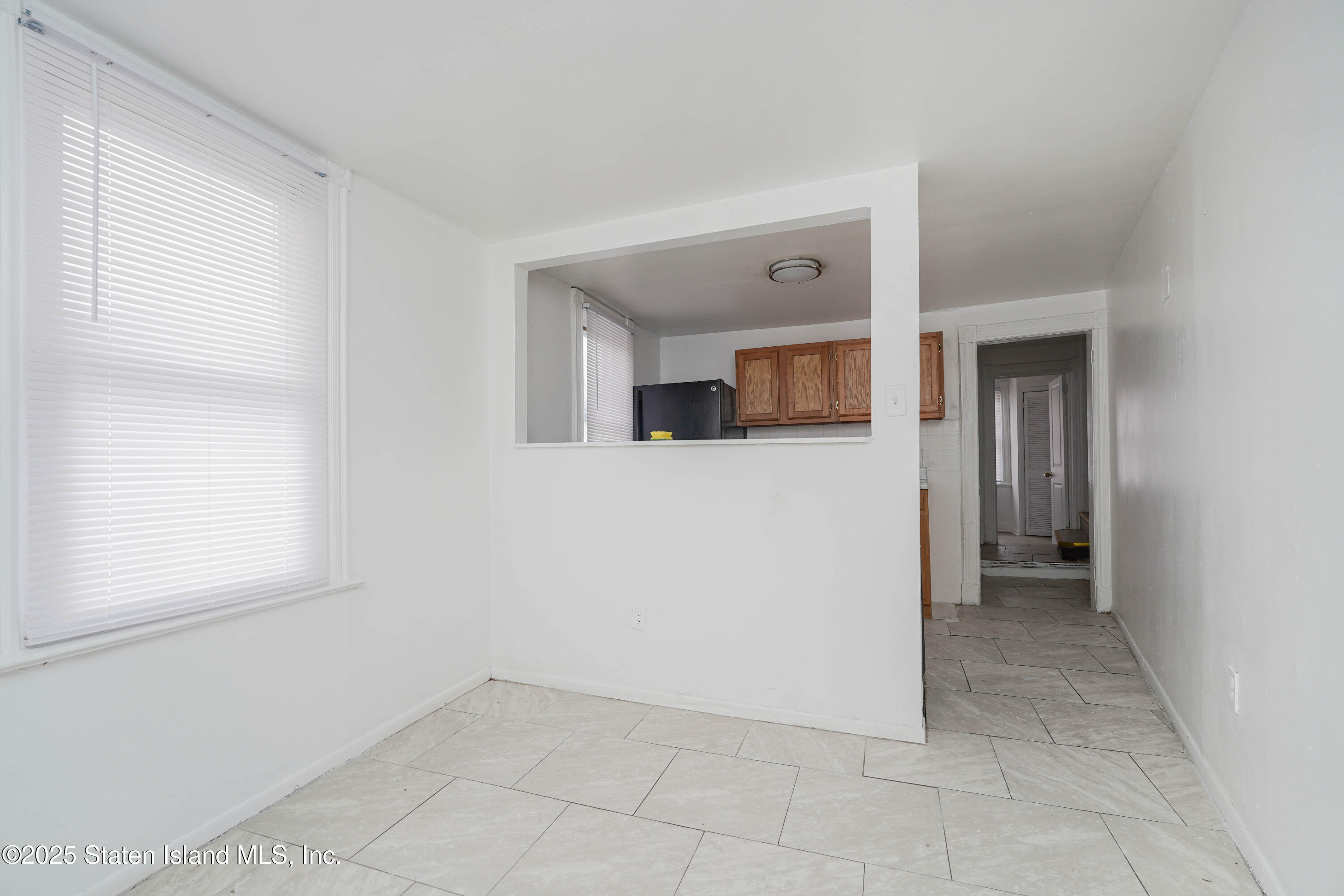 40 Larkin Street Staten Island, NY 10302 - Photo 17 of 36 a view of a room with a hallway and a window