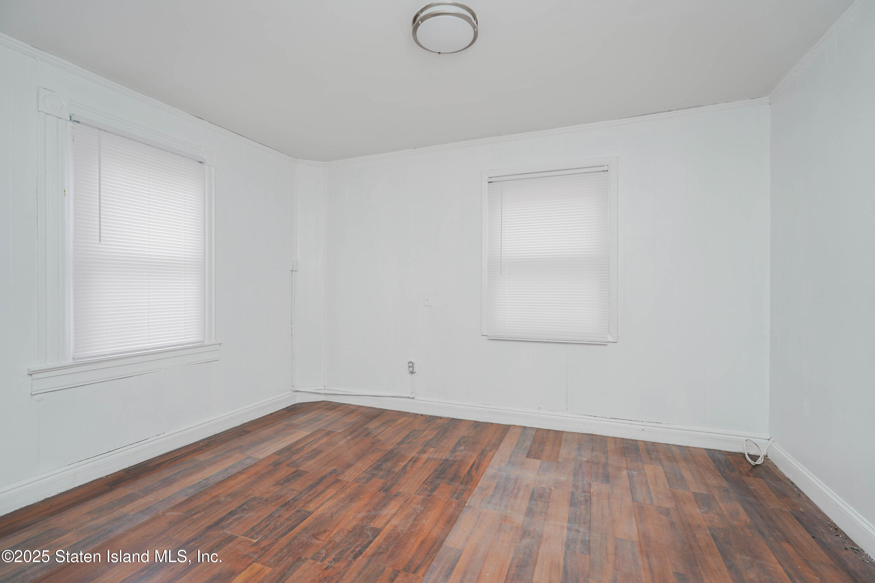 40 Larkin Street Staten Island, NY 10302 - Photo 8 of 36 wooden floor in an empty room