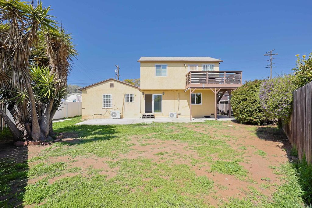 488 D Street Chula Vista, CA 91910 - Photo 25 of 25 a front view of a house with a yard