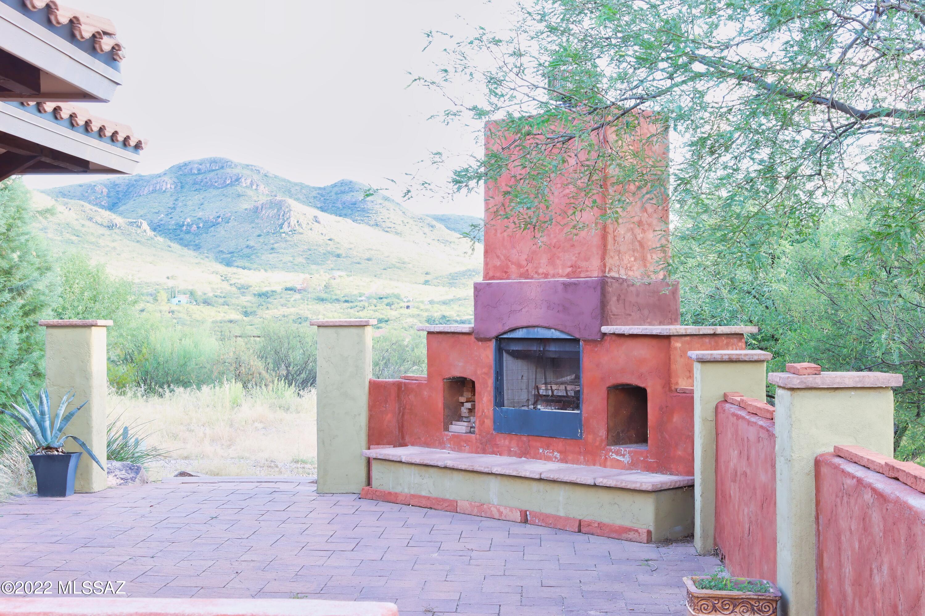 15393 East Hillton Ranch Road Vail, AZ 85641 - Photo 16 of 28 a front view of a house with a yard
