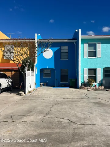 a view of a house with a patio