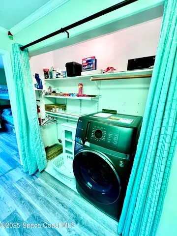 a utility room with dryer and washer