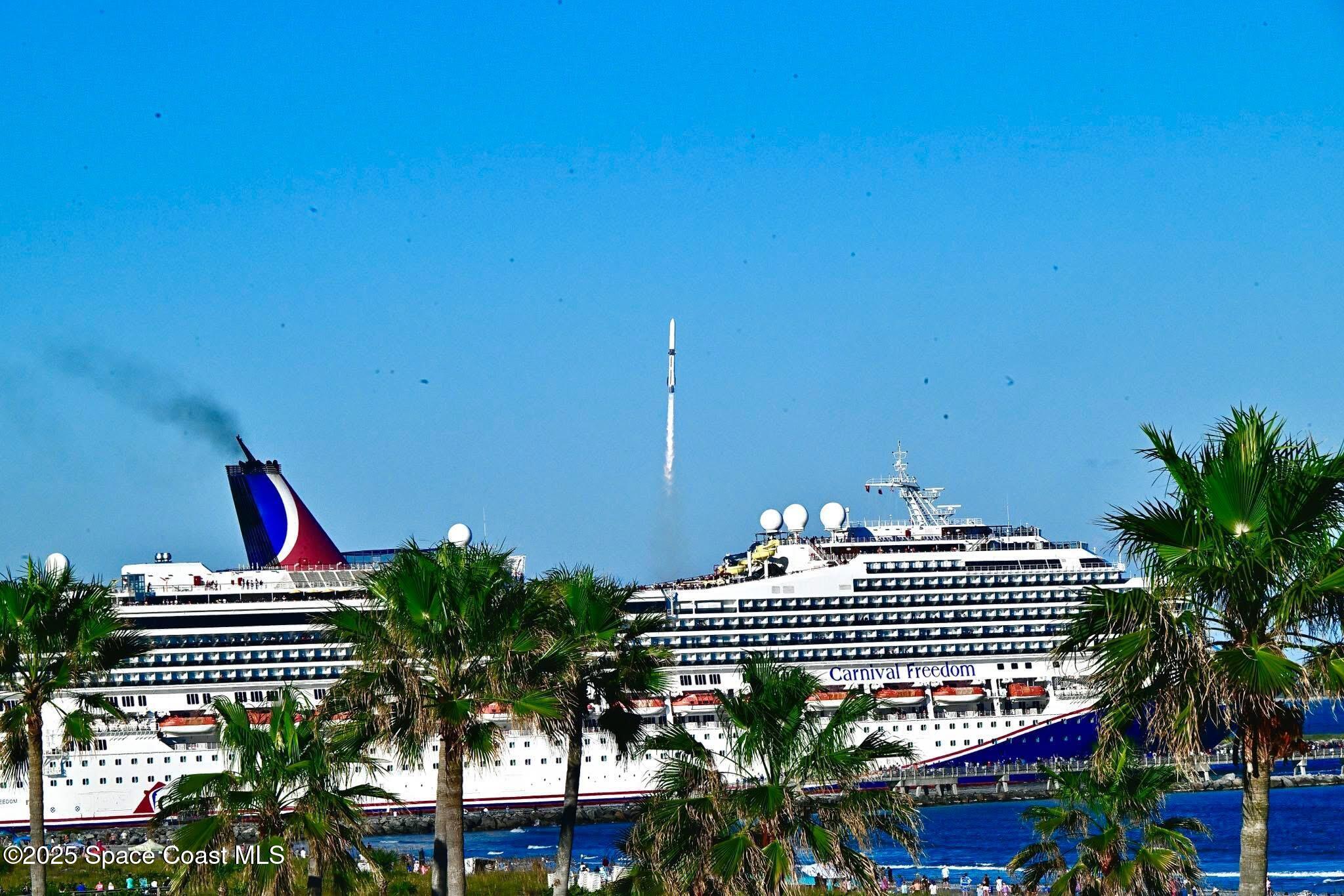 299 Chandler Street, Unit F Cape Canaveral, FL 32920 - Photo 22 of 26 a view of a city from a terrace