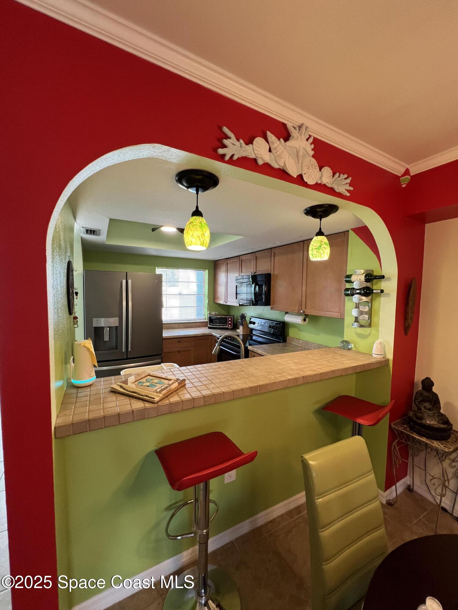 299 Chandler Street, Unit F Cape Canaveral, FL 32920 - Photo 6 of 26 a view of swimming pool with seating area