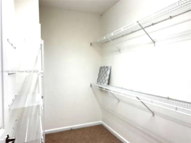 a view of a walk in closet