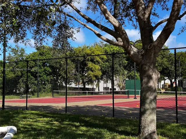 a aerial view of a house with swimming pool and porch
