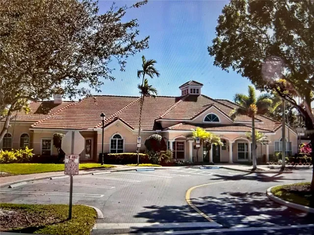 a view of park with sitting area