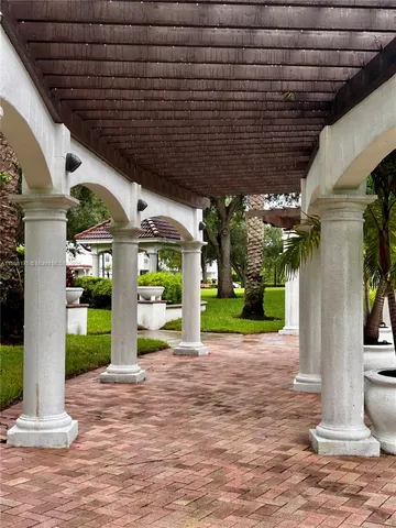 a view of two chairs in patio