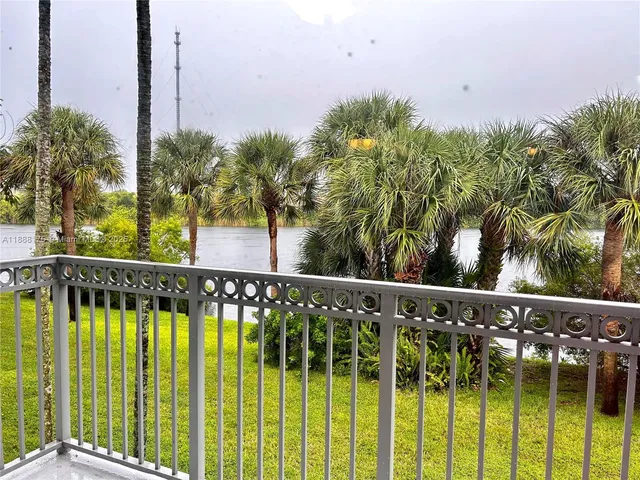 a view of a swimming pool with a garden