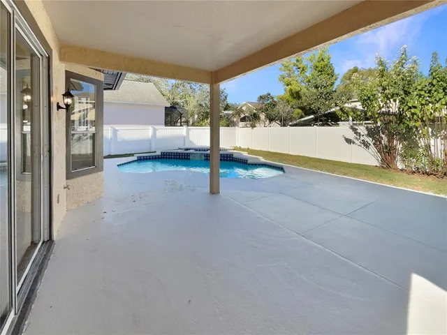 a picture of a bathroom with a shower