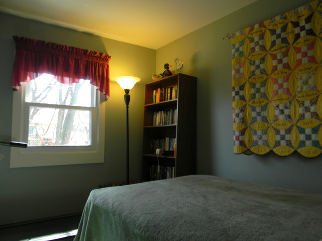 207 East Schaumburg Road Streamwood, IL 60107 - Photo 7 of 12 a bedroom with a bed and a window