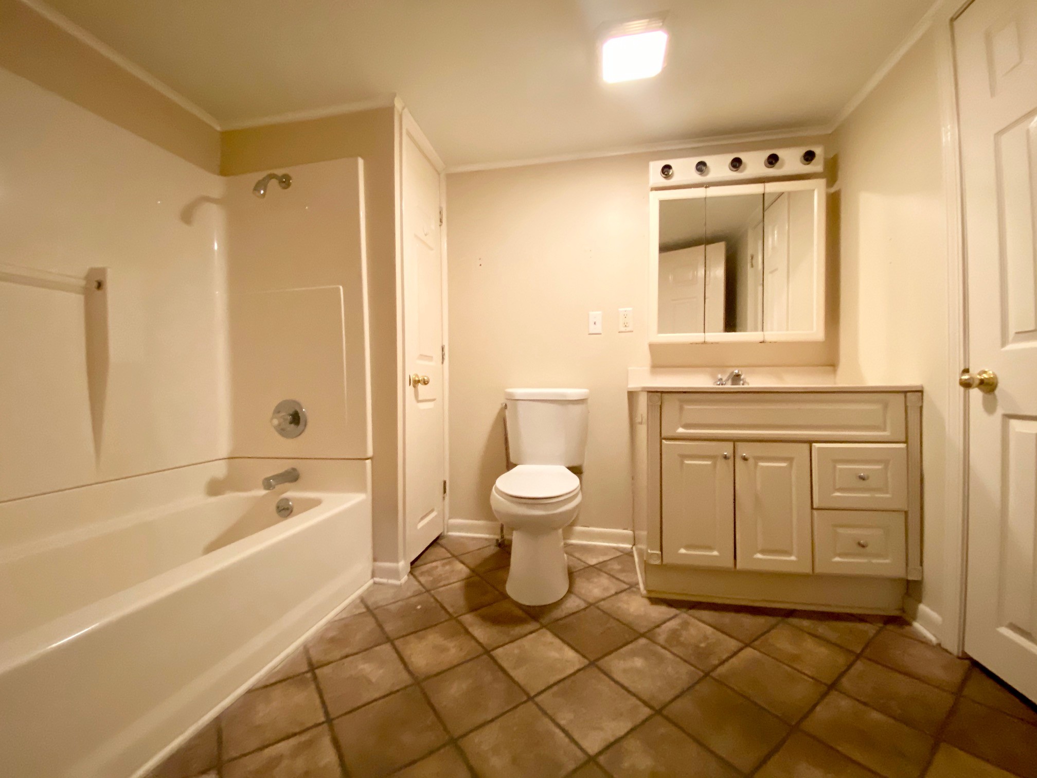 610 Days Road Lafayette, TN 37083 - Photo 11 of 13 a bathroom with a granite countertop sink toilet and shower