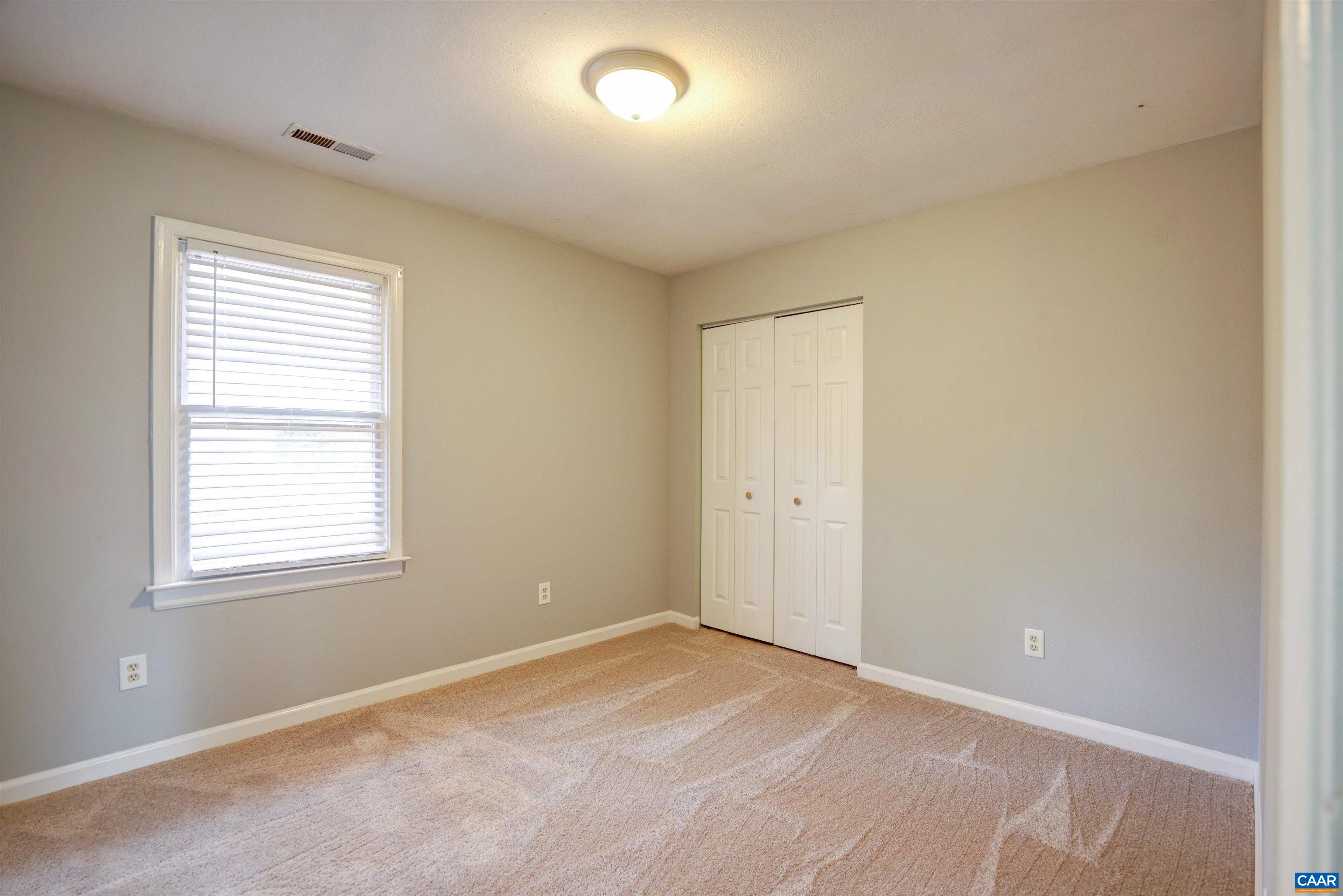1086 West Daffodil Road Ruckersville, VA 22968 - Photo 16 of 33 an empty room with a window