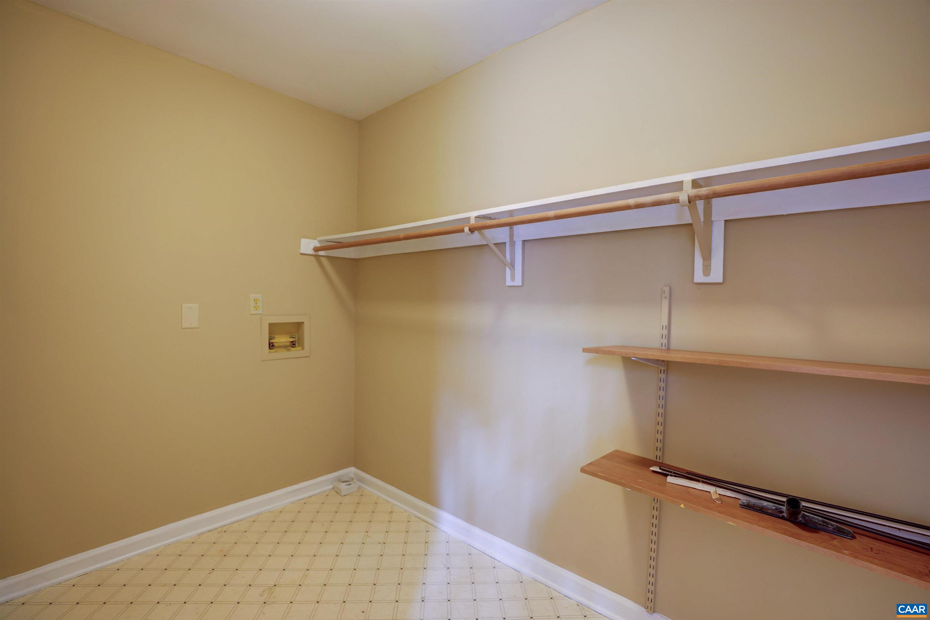 1086 West Daffodil Road Ruckersville, VA 22968 - Photo 19 of 33 a view of a room with racks on the wall
