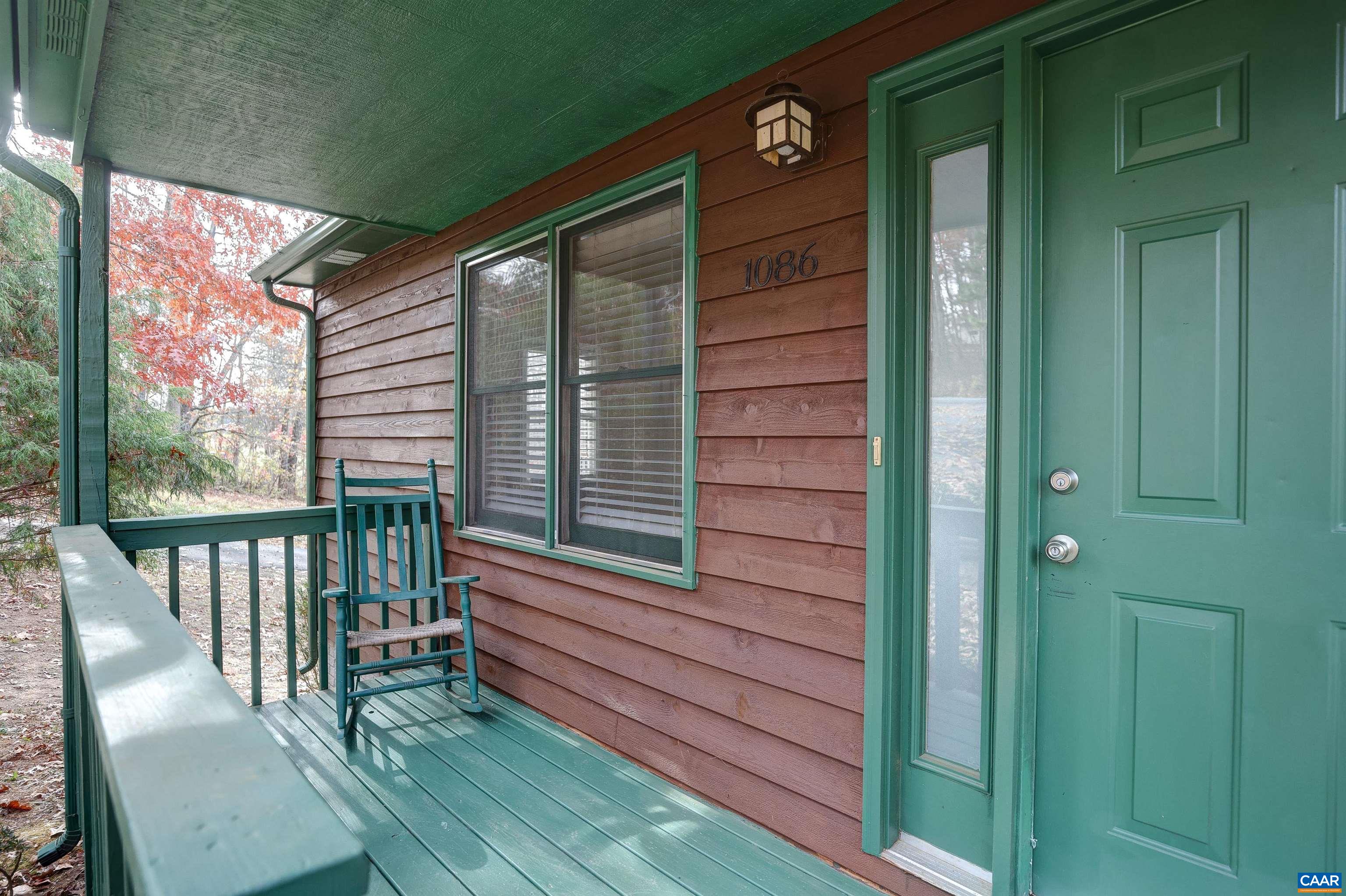 1086 West Daffodil Road Ruckersville, VA 22968 - Photo 2 of 33 a balcony with view of outdoor space