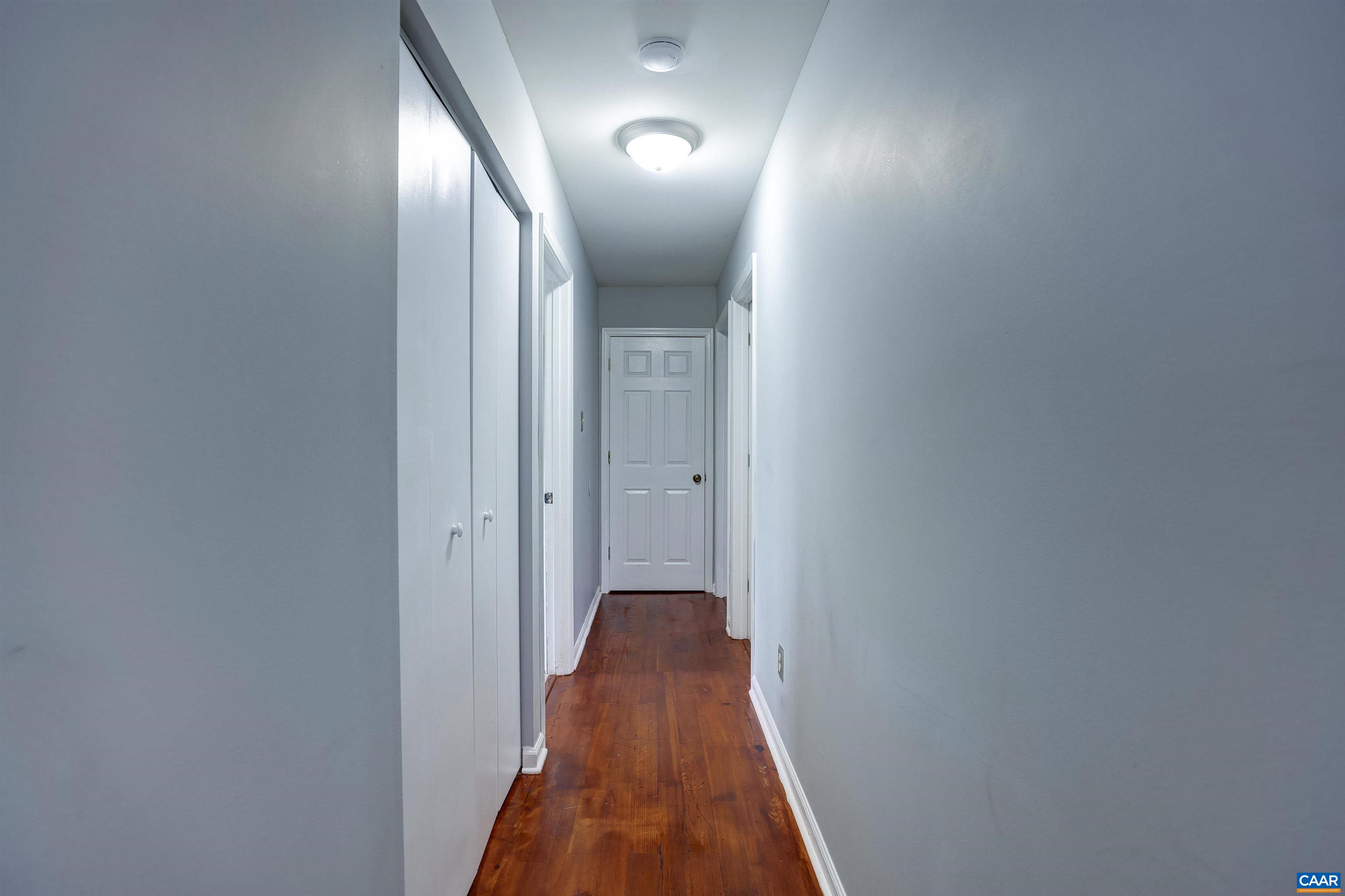 1086 West Daffodil Road Ruckersville, VA 22968 - Photo 10 of 33 a view of a hallway with a door