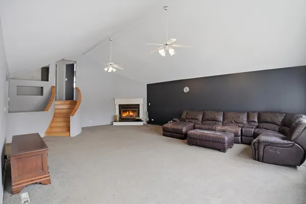 a living room with furniture and a couch
