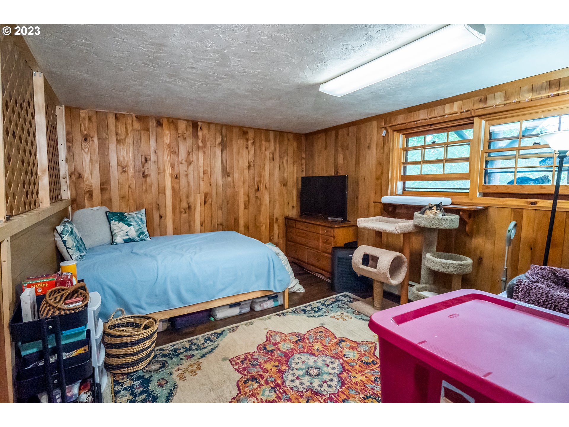 29588 Simmons Road Eugene, OR 97405 - Photo 25 of 44 a bedroom with furniture and a window