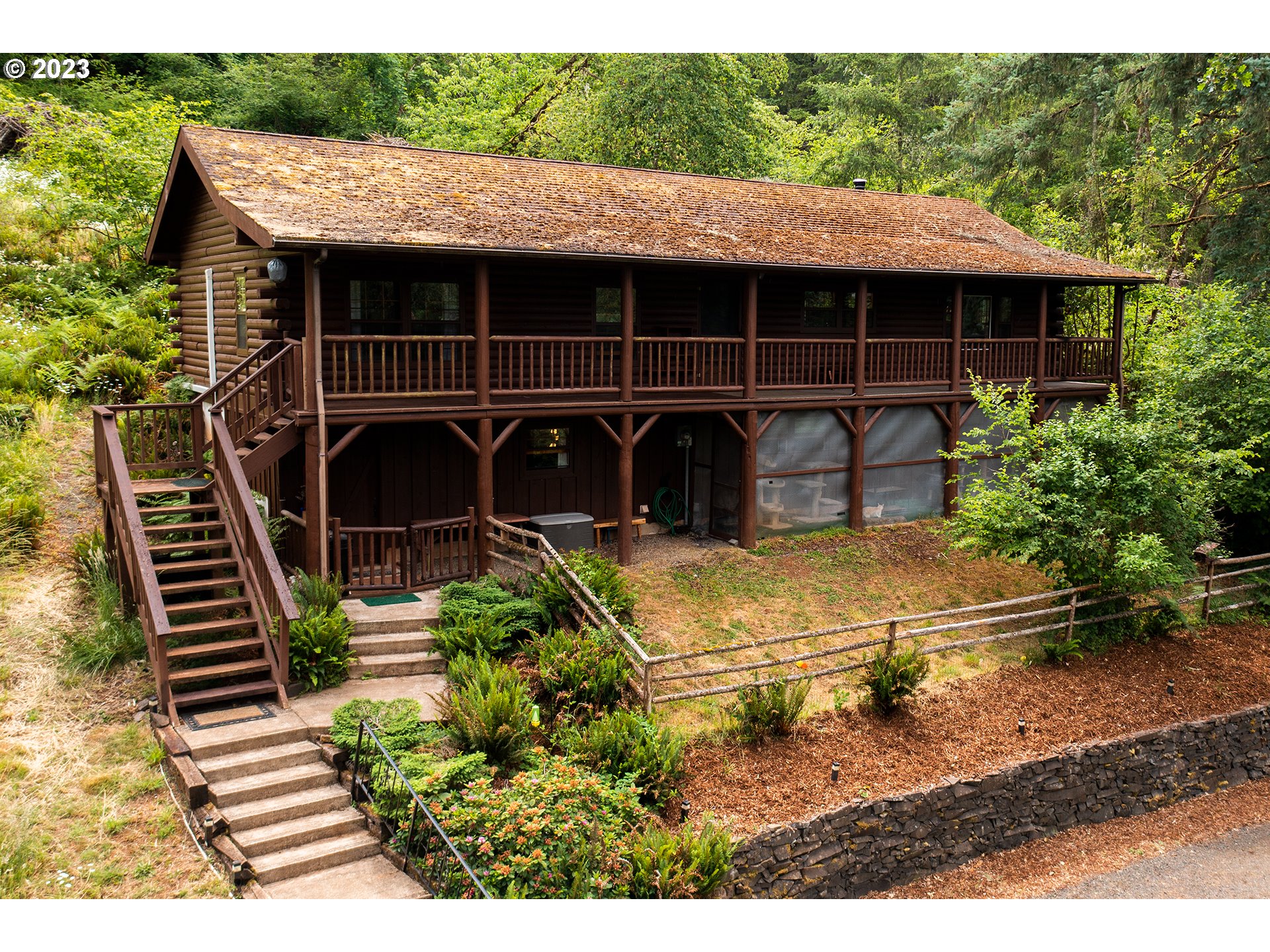 29588 Simmons Road Eugene, OR 97405 - Photo 3 of 44 a balcony with table and chairs
