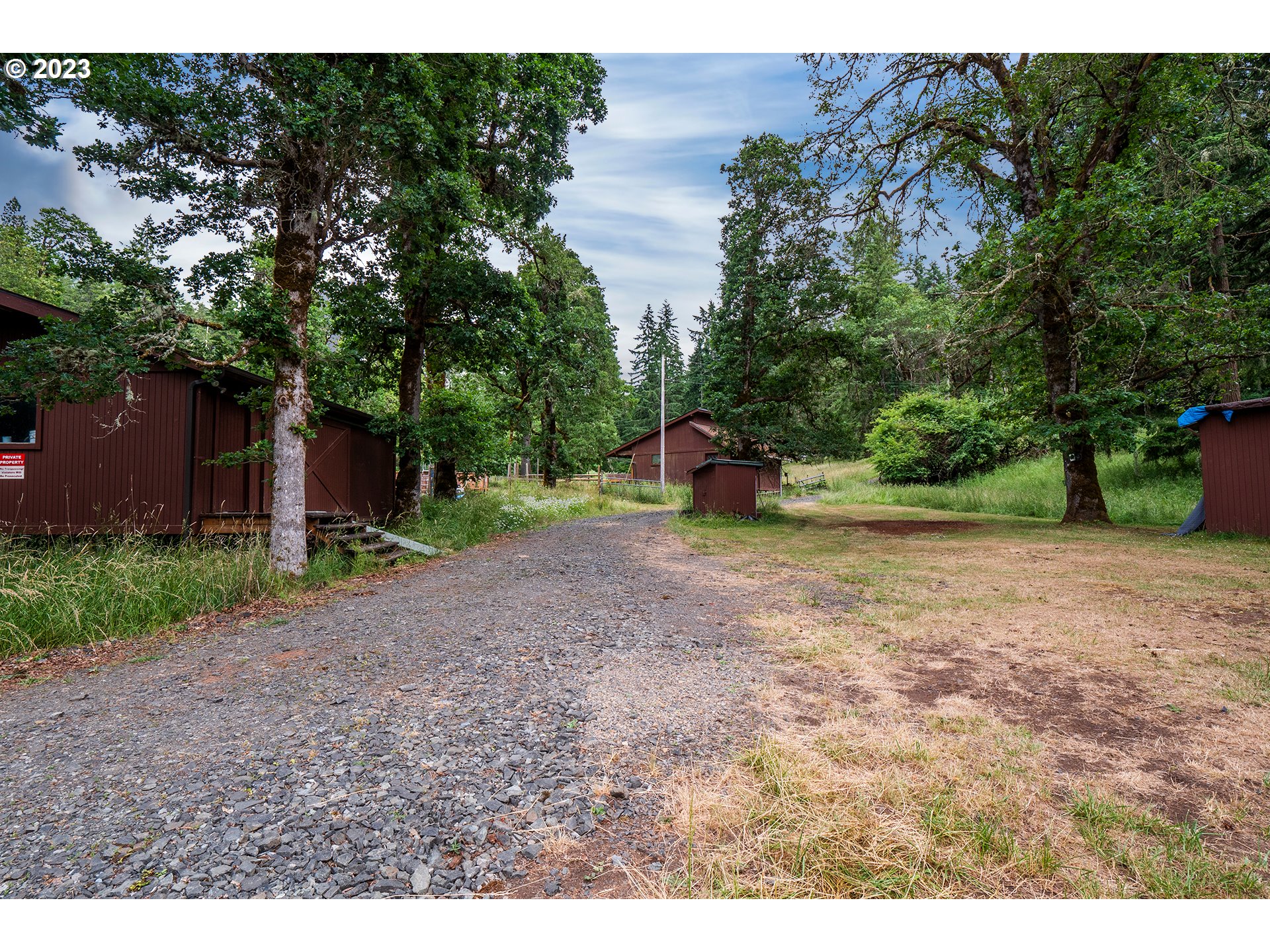 29588 Simmons Road Eugene, OR 97405 - Photo 33 of 44 a view of a backyard with large trees