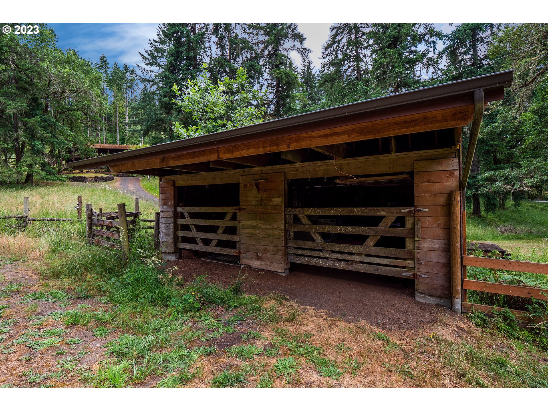 29588 Simmons Road Eugene, OR 97405 - Photo 36 of 44 a view of a wooden house and a yard