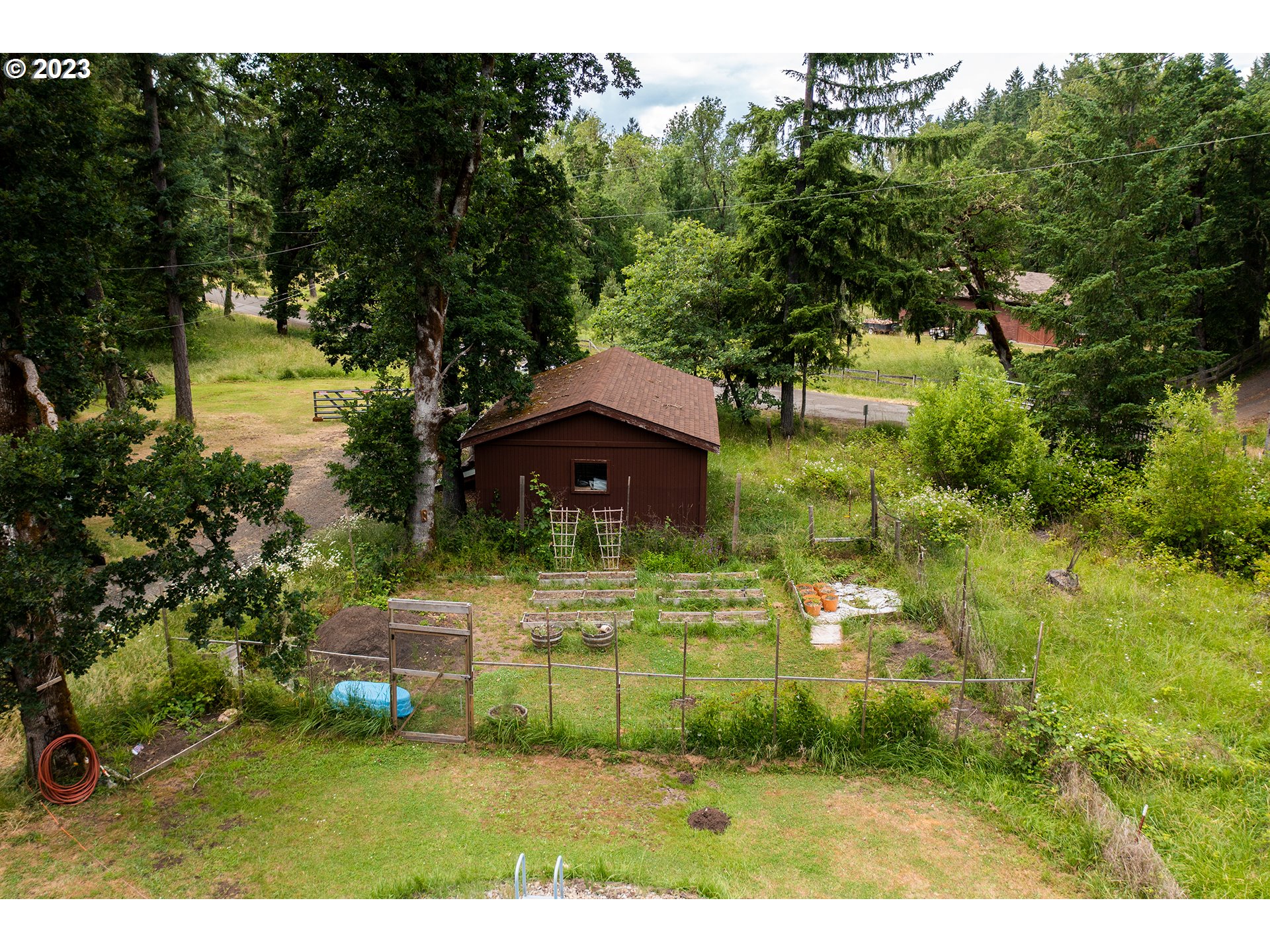 29588 Simmons Road Eugene, OR 97405 - Photo 41 of 44 a view of a house with a yard