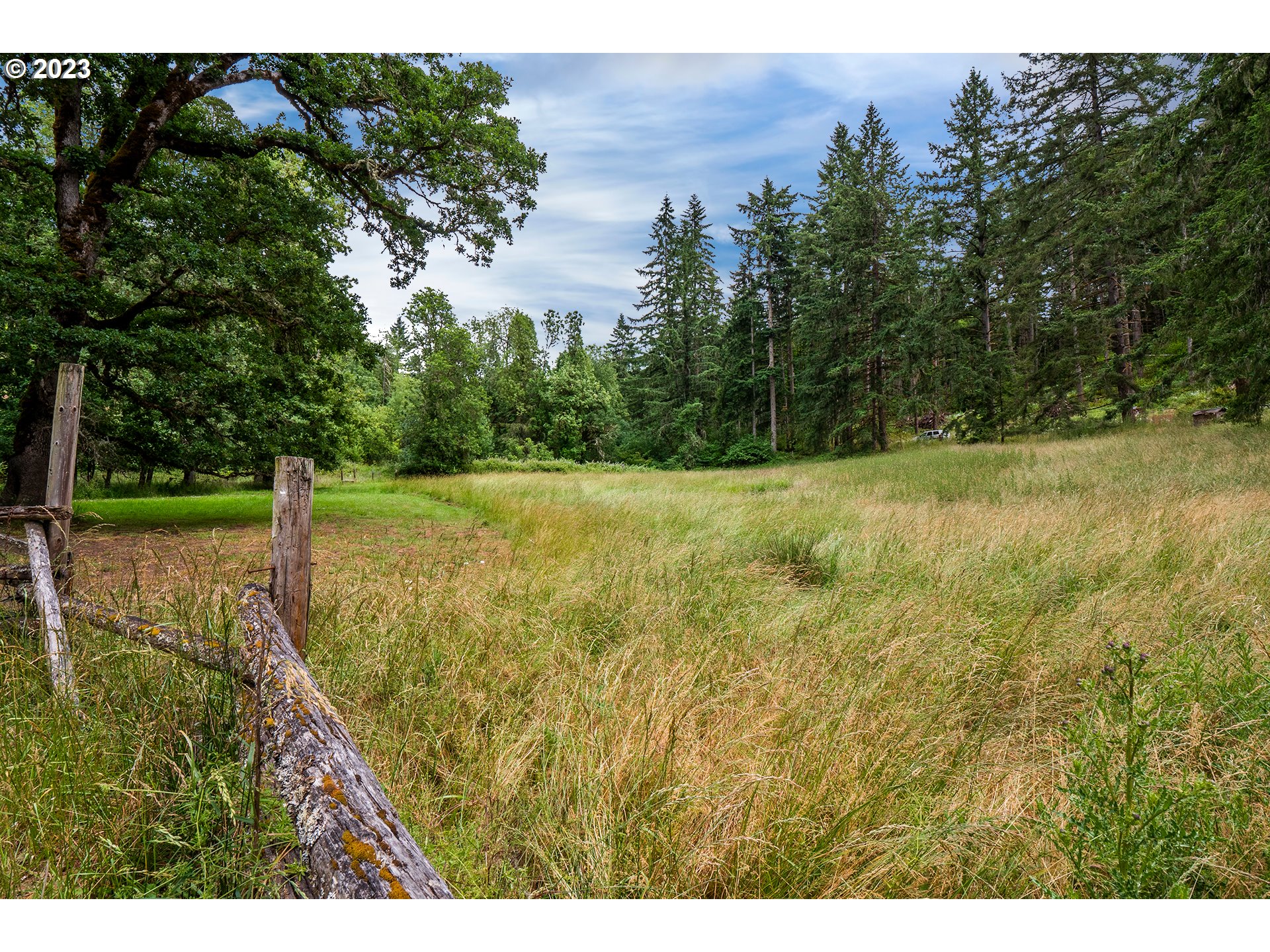 29588 Simmons Road Eugene, OR 97405 - Photo 44 of 44 a view of a yard with an outdoor space