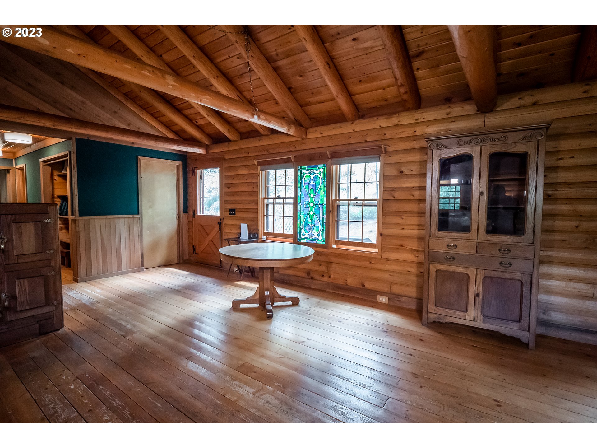 29588 Simmons Road Eugene, OR 97405 - Photo 9 of 44 a living room with furniture and a wooden floor