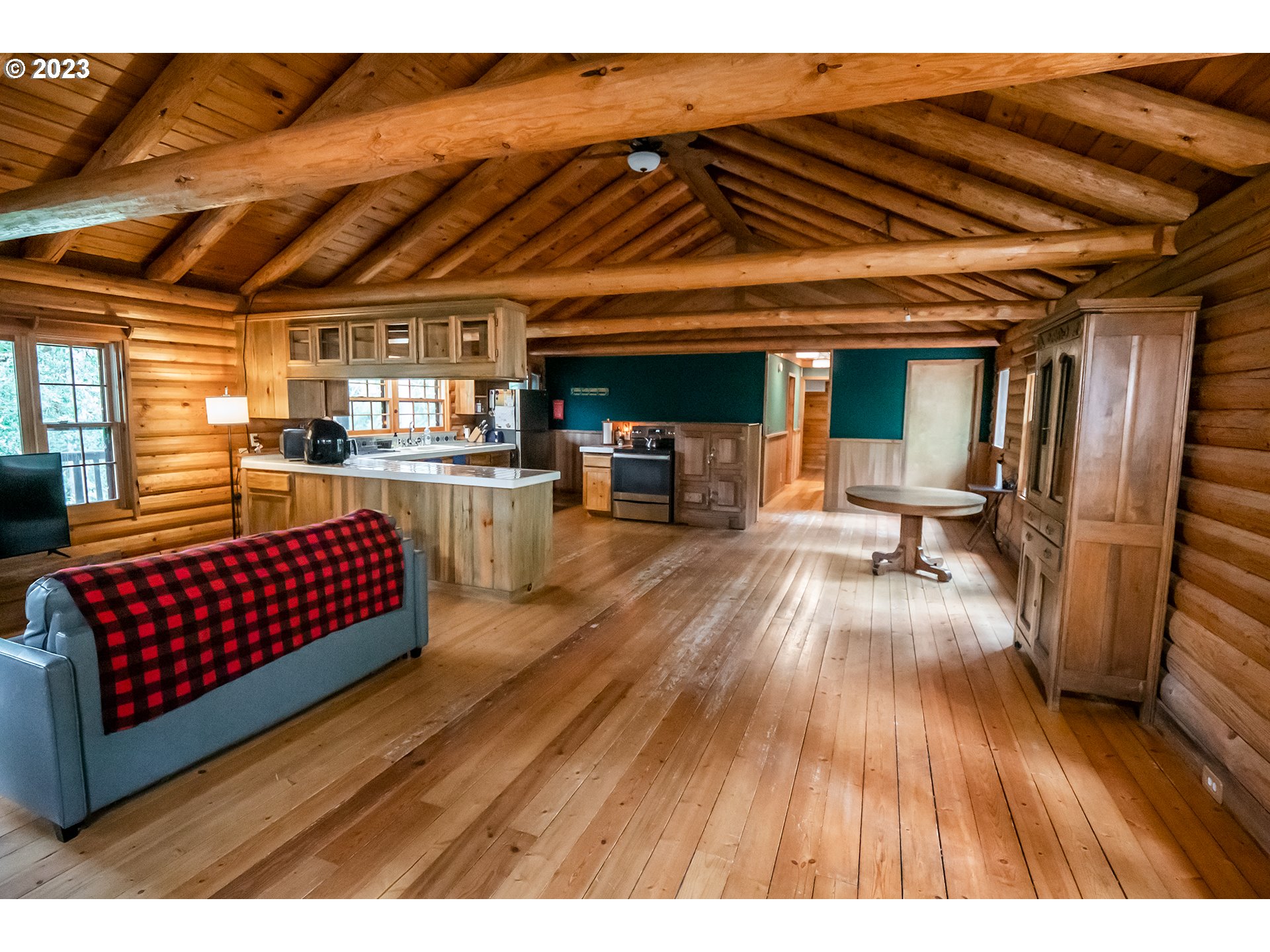 29588 Simmons Road Eugene, OR 97405 - Photo 10 of 44 a living room with furniture and a wooden floor