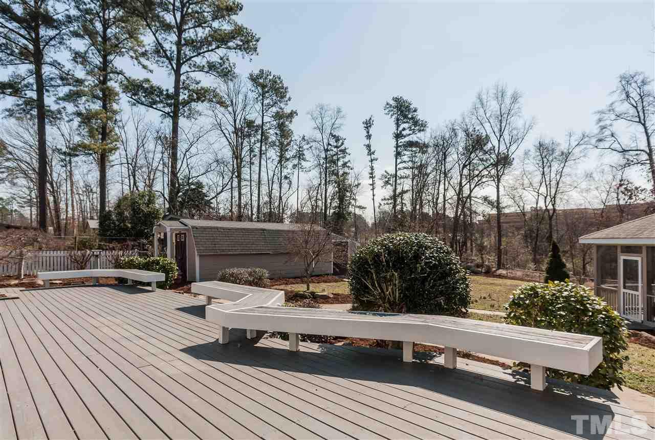 3924 Haithcock Road Raleigh, NC 27604 - Photo 22 of 25 a view of a roof deck with couches and wooden floor