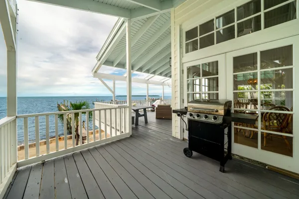 a view of a swimming pool with an ocean view