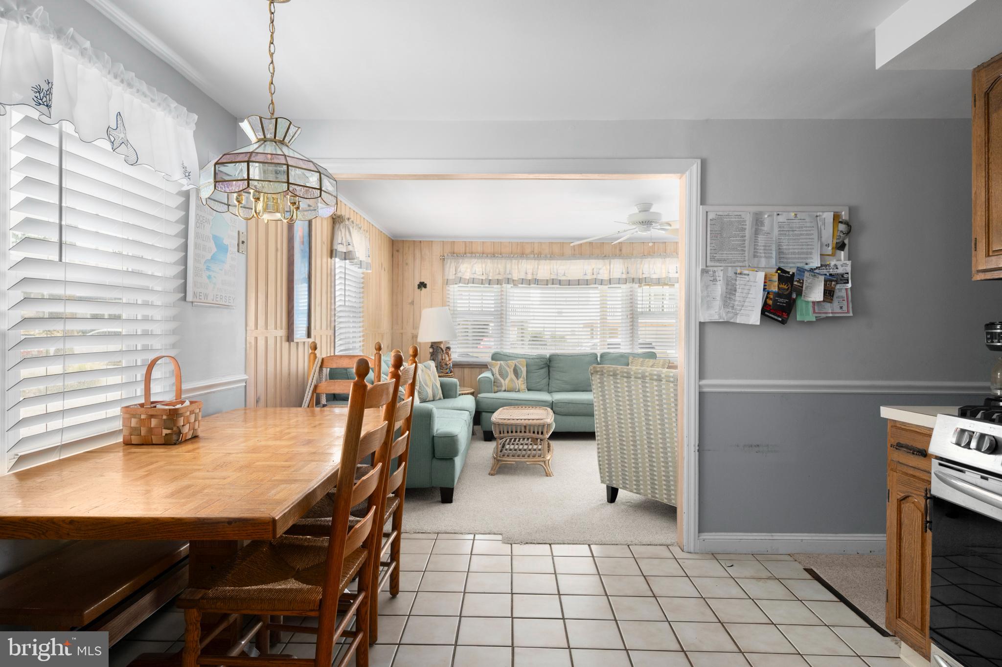 33 19th Street Surf City, NJ 08008 - Photo 14 of 63 a dining room with furniture and window
