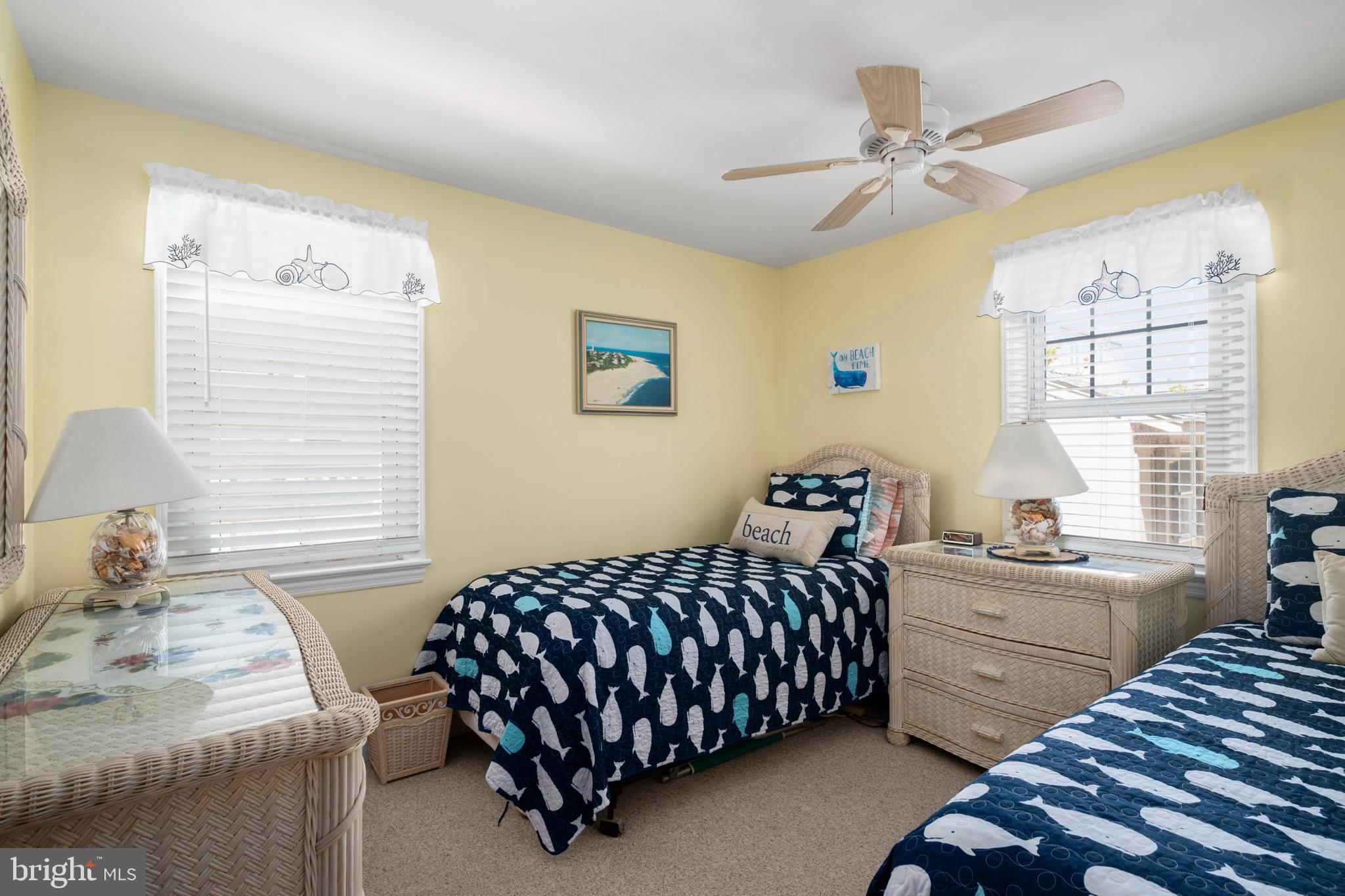 33 19th Street Surf City, NJ 08008 - Photo 20 of 63 a bedroom with a bed and a window