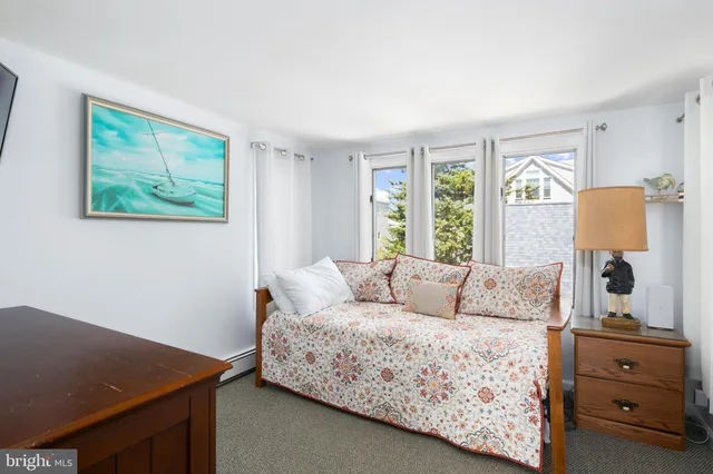 a view of a chairs and table in the balcony