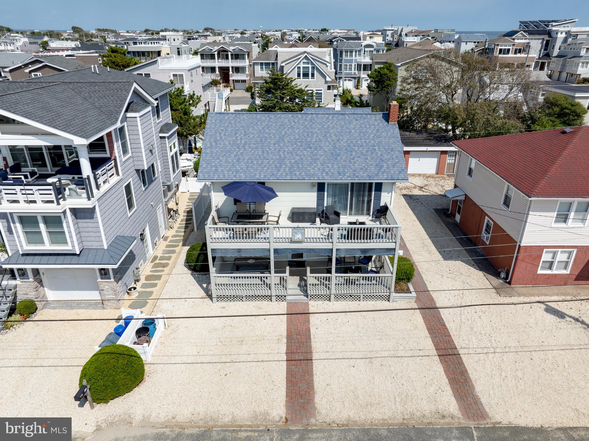 33 19th Street Surf City, NJ 08008 - Photo 46 of 63 a view of multiple houses with a street