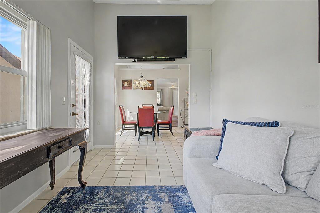 2662 Appleleaf Court Spring Hill, FL 34606 - Photo 29 of 47 a living room with furniture and a flat screen tv