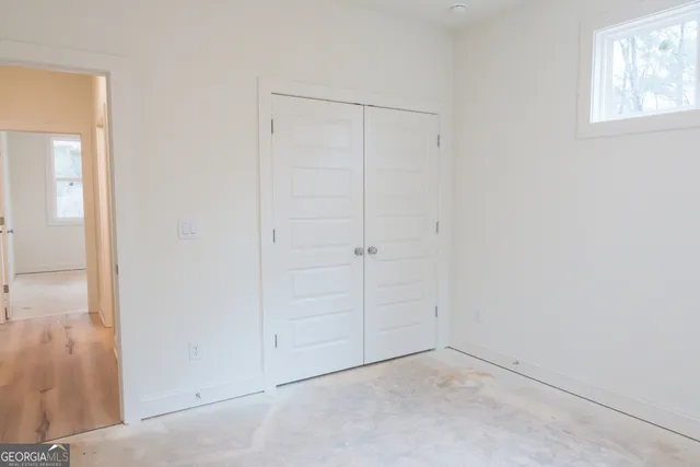 a room with storage and window