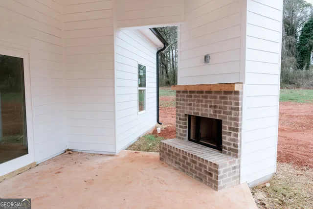 a view of a livingroom with a flat screen tv